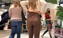 A sexy blonde teen in brown leggings shows off her big ass